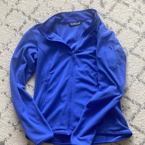 Blue arc’teryx fleece jacket